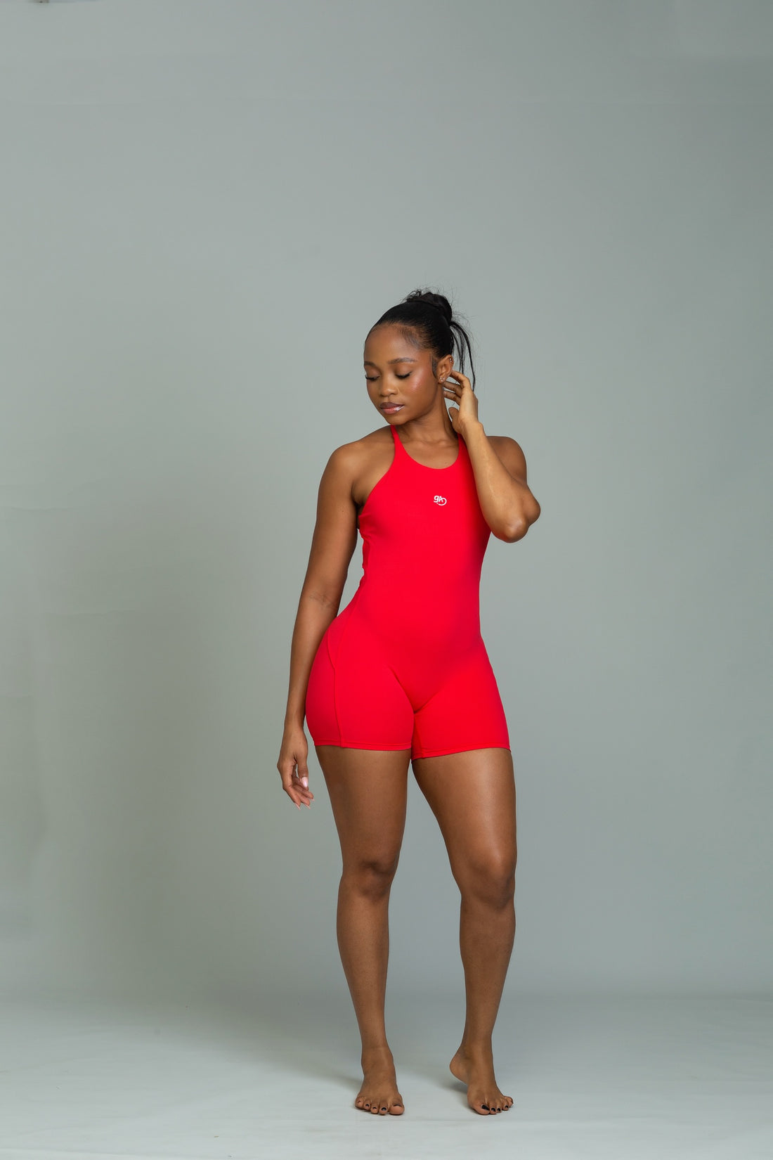 Grounded cross-back strappy romper (scarlet)